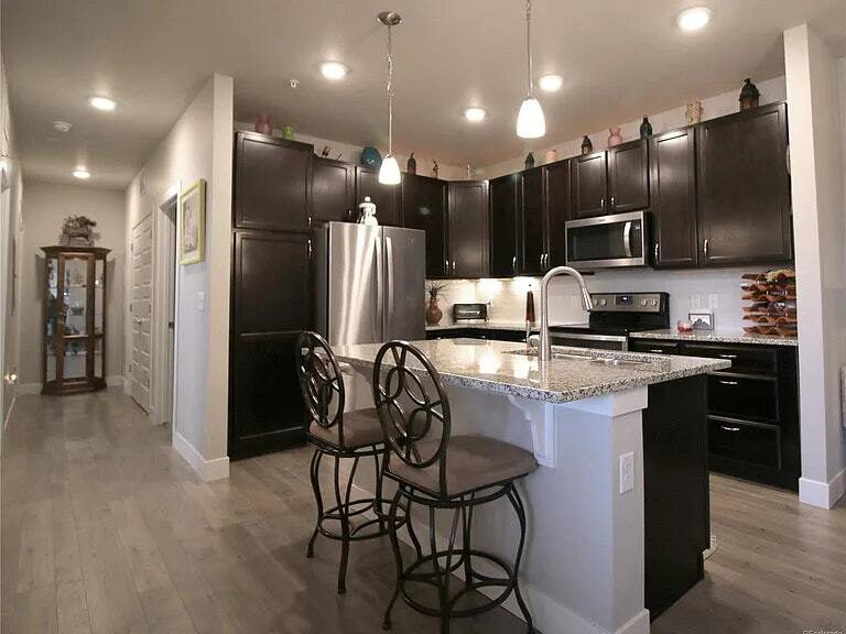 15274 W 64th Ln in Arvada, CO - Building Photo