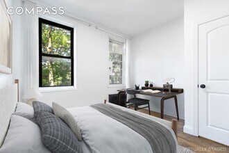 315 E 5th St, Unit 1107 in New York, NY - Building Photo - Building Photo