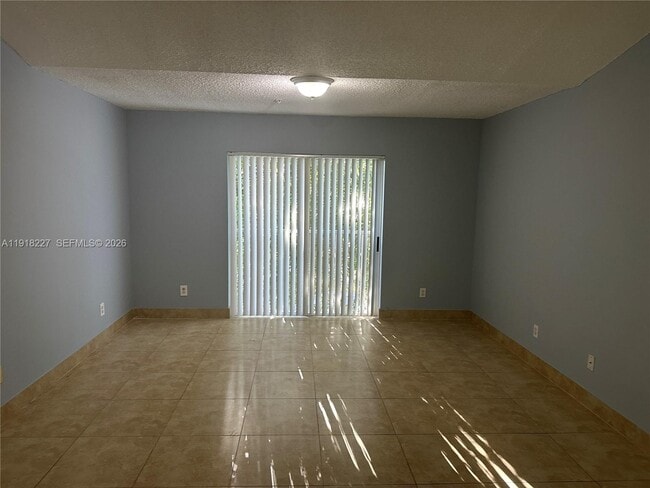 9907 Westwood Dr in Tamarac, FL - Building Photo - Building Photo
