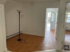 49 AVENUE, Unit 1 in Queens, NY - Building Photo - Building Photo