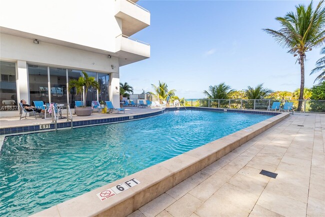 property at 9225 Collins Ave