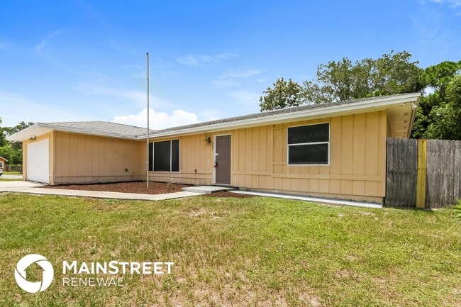 701 NW Grenada St in Port St. Lucie, FL - Building Photo - Building Photo