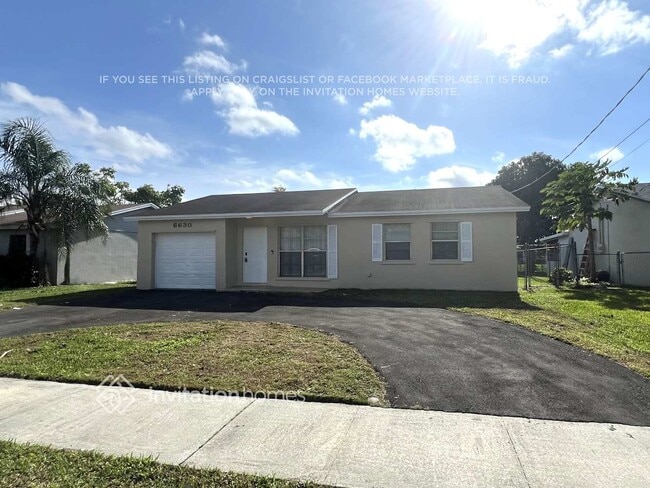 property at 6630 NW 24th Ct