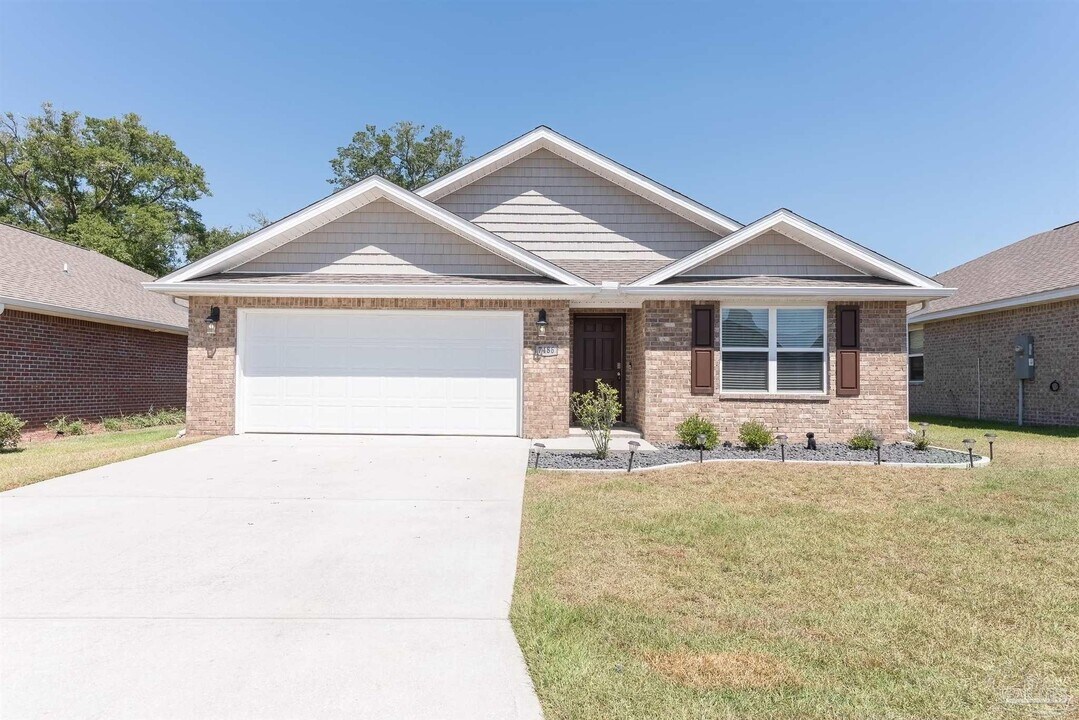 7486 Oak Lake Blvd in Bellview, FL - Building Photo