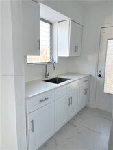 6895 Byron Ave in Miami, FL - Building Photo - Building Photo