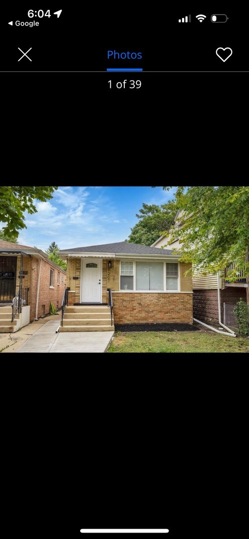 property at 9207 S Woodlawn Ave