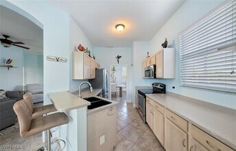 9050 Las Maderas Dr in Bonita Springs, FL - Building Photo - Building Photo