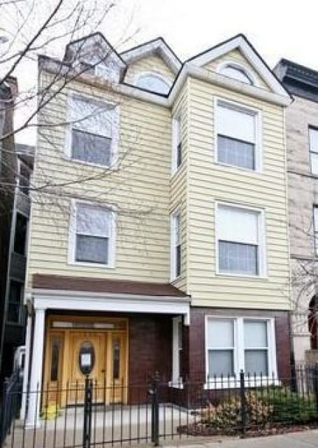 1038 W Roscoe St, Unit 3F in Chicago, IL - Building Photo