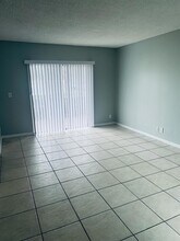1564 SE Royal Green Cir, Unit 103 in Port St. Lucie, FL - Building Photo - Building Photo