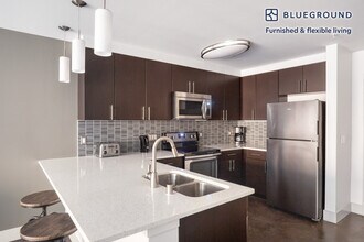 10555 Main St-Unit -FL3-ID528 in Bellevue, WA - Building Photo - Building Photo