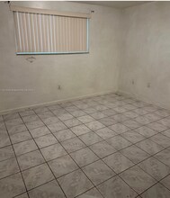 11311 SW 200th St, Unit D104 in Miami, FL - Foto de edificio - Building Photo