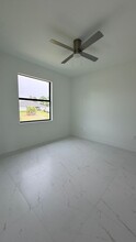 1105 Dean St E in Lehigh Acres, FL - Building Photo - Building Photo