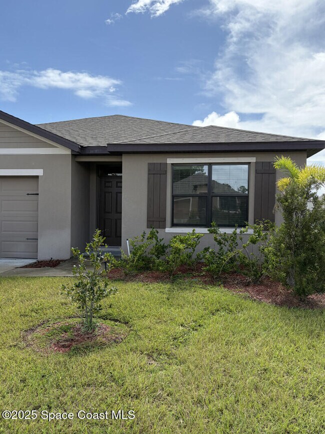 1453 Mineral Lp Dr NW in Palm Bay, FL - Building Photo - Building Photo
