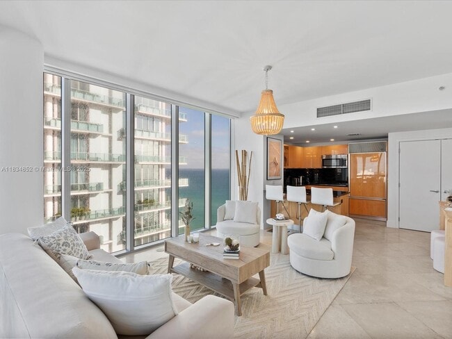 property at 6899 Collins Ave