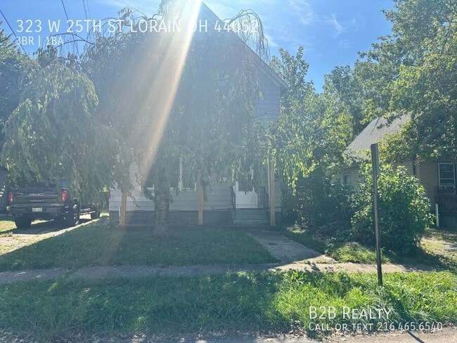 property at 323 W 25th St