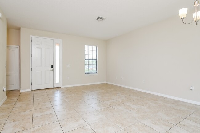 1458 Pacific Rd in Poinciana, FL - Building Photo - Building Photo