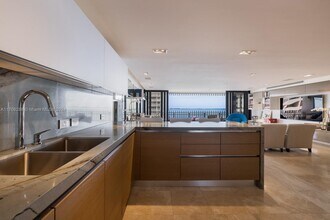 1 Grove Isle Dr, Unit 907 in Miami, FL - Building Photo - Building Photo