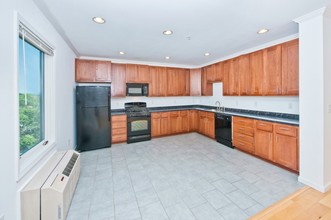 Village Lofts Apartments in Hempstead, NY - Building Photo - Interior Photo