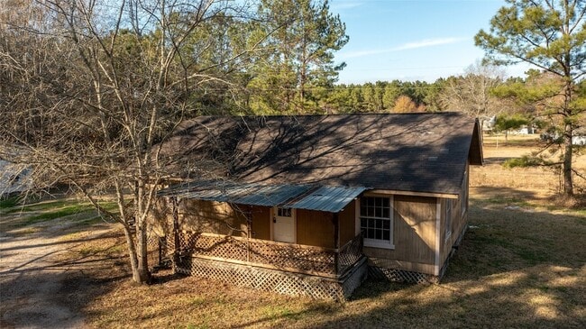 2407 County Rd 2235 in Cleveland, TX - Foto de edificio - Building Photo
