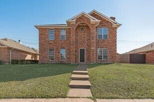9406 Chimneywood Dr in Rowlett, TX - Building Photo