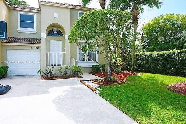 property at 15472 NW 12th Ct