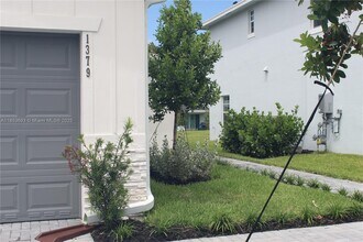 1379 Tangled Orchard Tr in Loxahatchee, FL - Building Photo - Building Photo