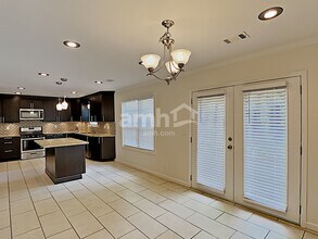 1067 Woodsong Pass Ct in Lawrenceville, GA - Foto de edificio - Building Photo