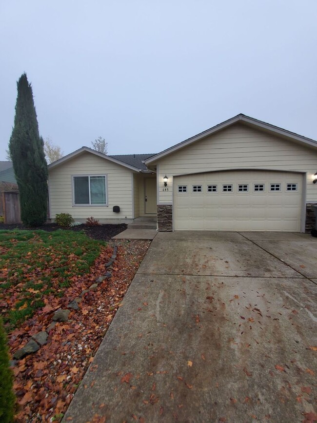property at 645 NE Whirlwind Dr