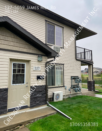 Upper level unit in Harbour Landing in Regina, SK - Building Photo - Building Photo