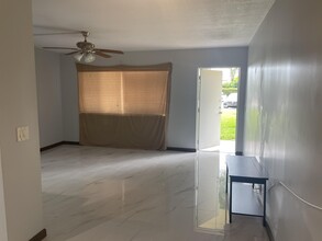 400 Village Green Cir W in Palm Springs, FL - Building Photo - Building Photo