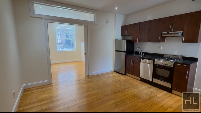 207-209-209 W 11th St