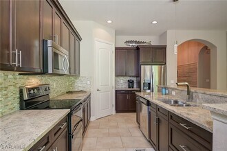 1630 Serrano Cir in Naples, FL - Building Photo - Building Photo