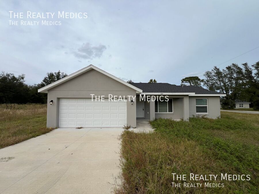 297 Malauka Run in Ocklawaha, FL - Building Photo