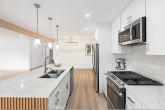 7009 Hatillo Ave in Winnetka, CA - Building Photo - Building Photo