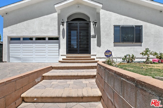 property at 12643 Archwood St