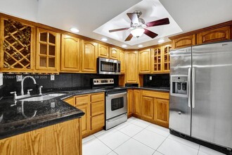8 Meacham Ln in Tamarac, FL - Foto de edificio - Building Photo