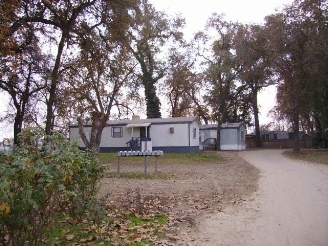 River Bend Mobile Home Park in Sanger, CA - Building Photo