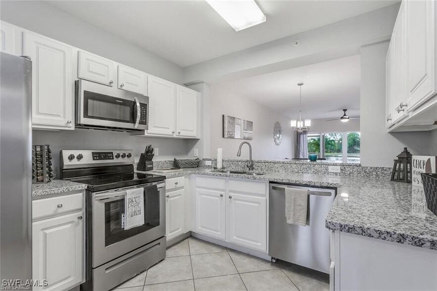 10020 Maddox Ln, Unit 213 in Bonita Springs, FL - Building Photo