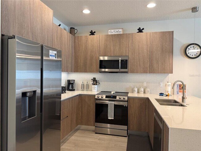 1409 Serendipity Ln in Four Corners, FL - Building Photo - Building Photo