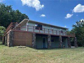 12828 Trammel Dr in Lowell, AR - Building Photo