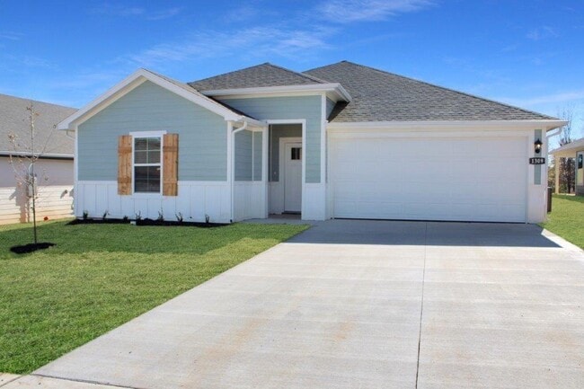 property at 306 NW Granny Smith St
