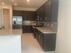 11933 SW Poseidon Way in Port St. Lucie, FL - Building Photo - Building Photo