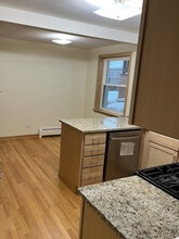 6537 N Natoma Ave, Unit 1 in Chicago, IL - Foto de edificio - Building Photo