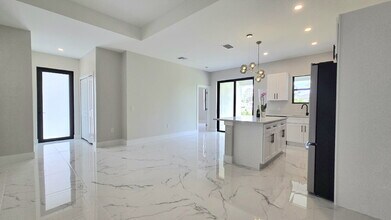 702 Hightower Ave S in Lehigh Acres, FL - Building Photo - Building Photo