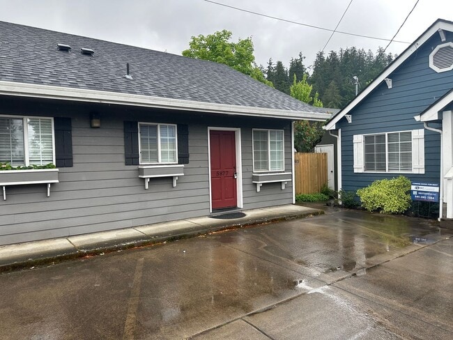 property at 5877 Main St