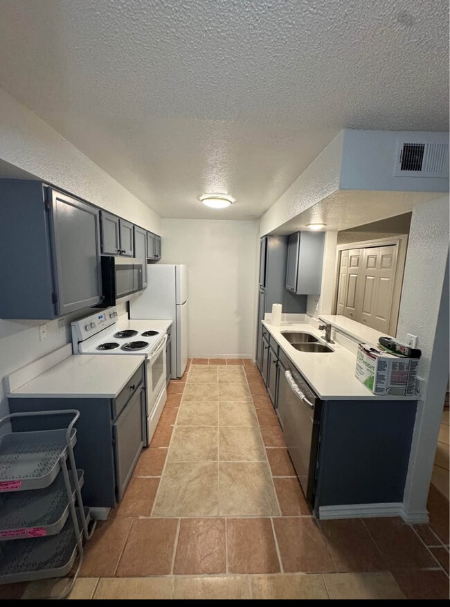 1075 S Elkhart Way, Unit sunnyside condominium in Aurora, CO - Building Photo - Building Photo