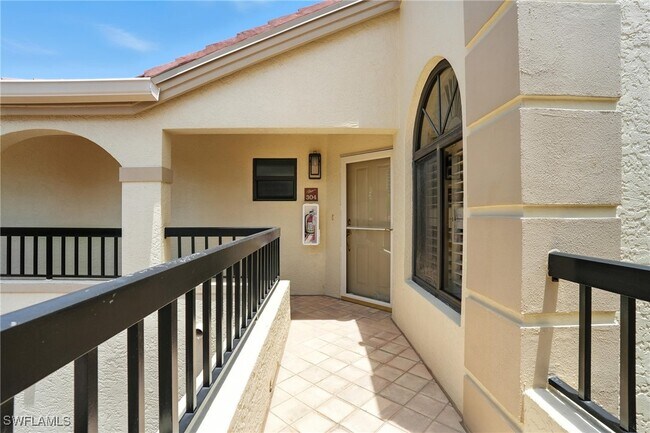 property at 7032 Pelican Bay Blvd