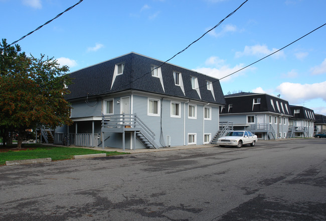 The Courtyard Apartments in Lansing, MI - Building Photo - Building Photo