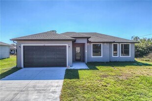 1132 Cummings St E in Lehigh Acres, FL - Building Photo