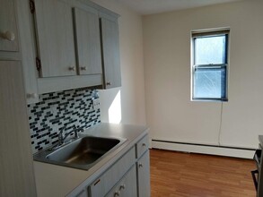 4925 Washington St, Unit 406 in Boston, MA - Building Photo - Building Photo